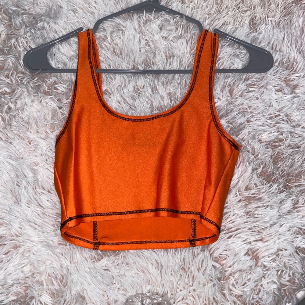 Orange and black stitch top